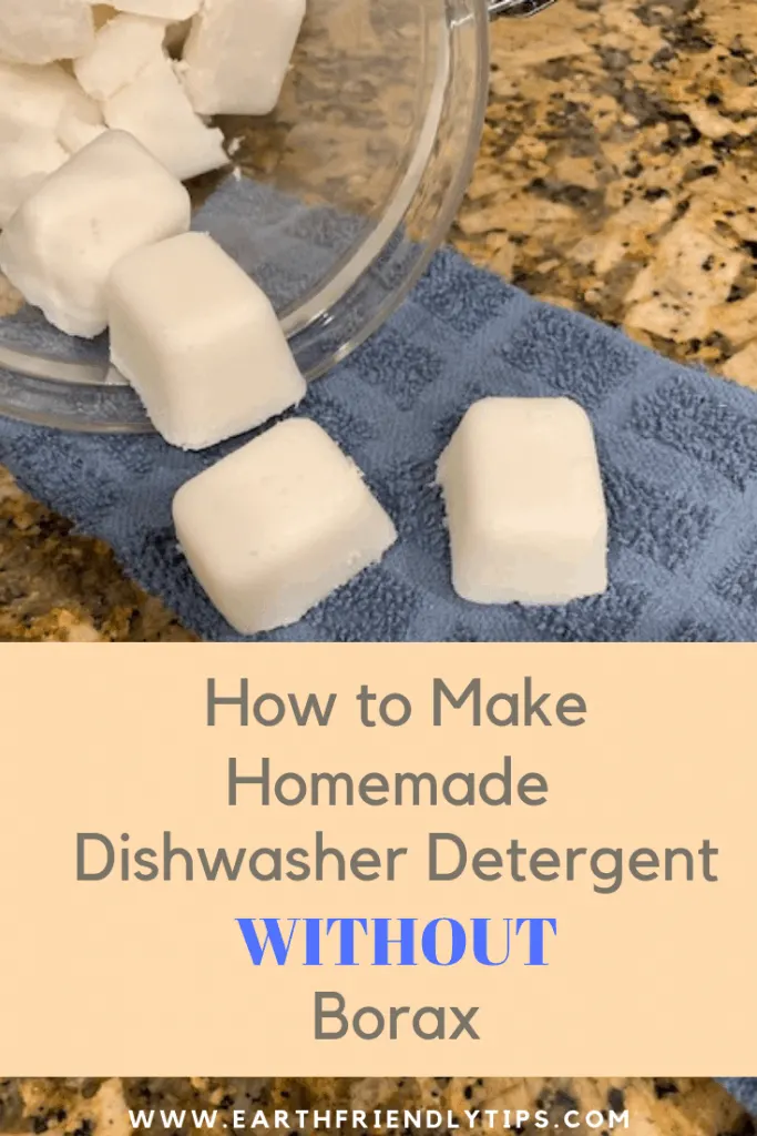 White dishwasher tablets on blue towel with text overlay How to Make Homemade Dishwasher Detergent Without Borax
