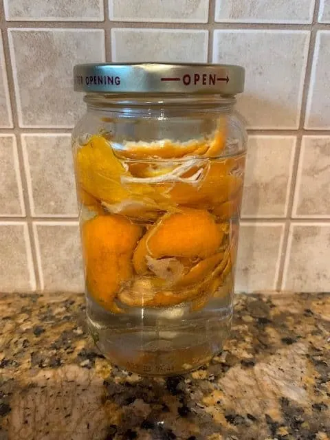 Citrus-infused vinegar in a glass jar