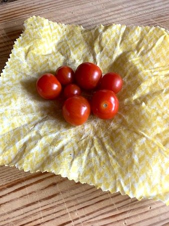 Tomatoes sitting on beeswax food wrap