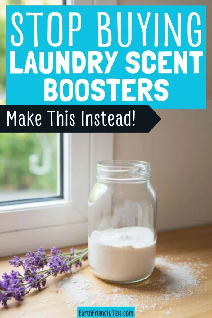 Picture of a glass jar of homemade laundry scent booster sitting on a wooden surface next to a sprig of lavender with text overlay Stop Buying Laundry Scent Boosters Make This Instead!